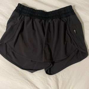 Black Lululemon shorts size 6. Perfect condition other than the tag ripped out!